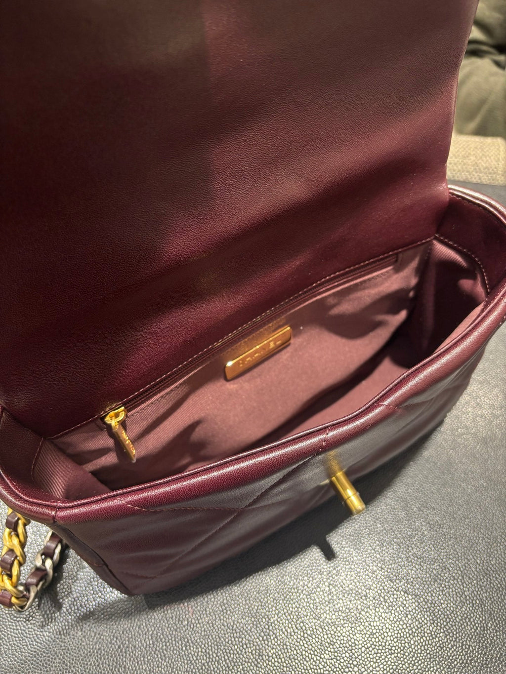 Chanel 19 burgundy flap bag interior view