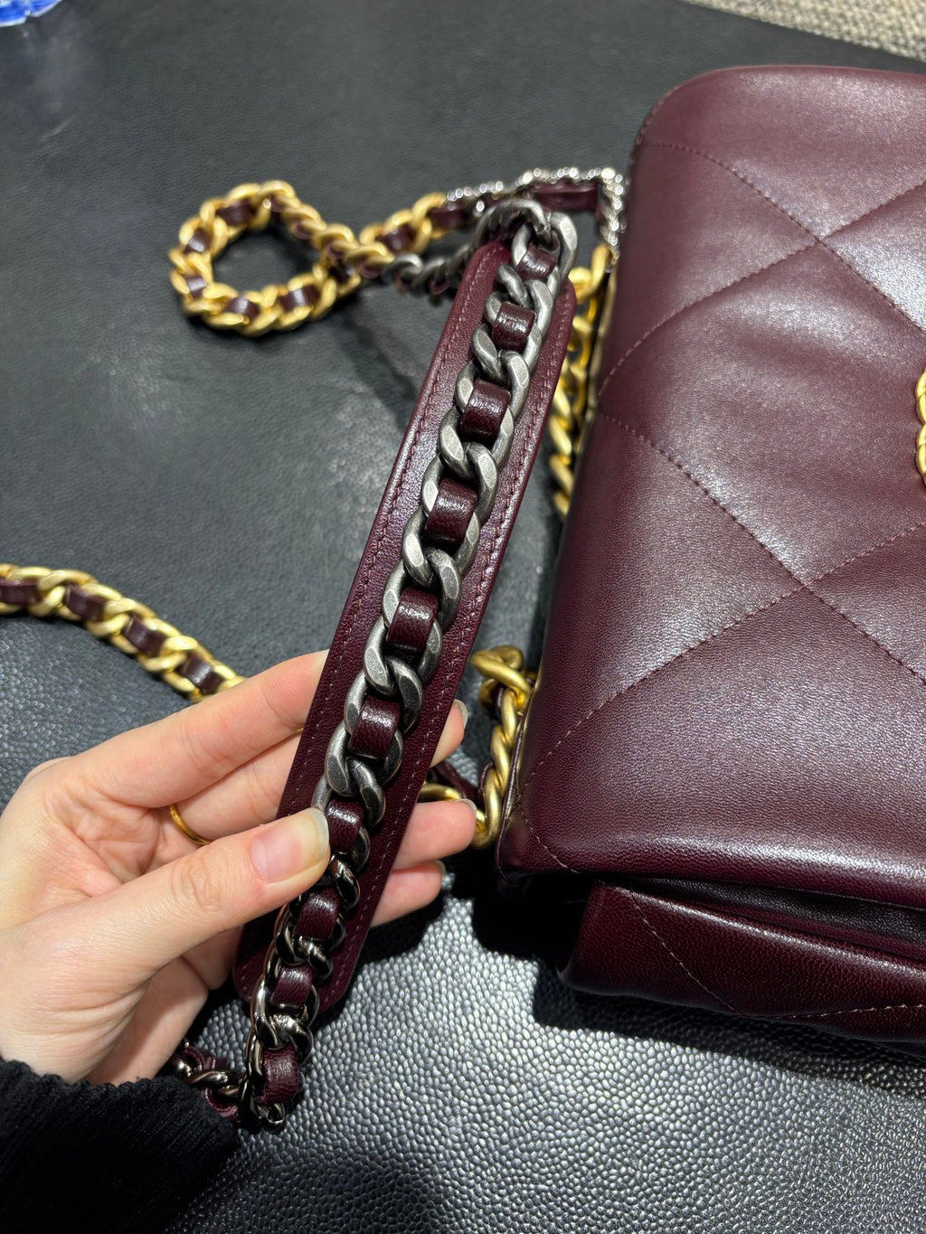 Chanel 19 burgundy flap bag chain detail