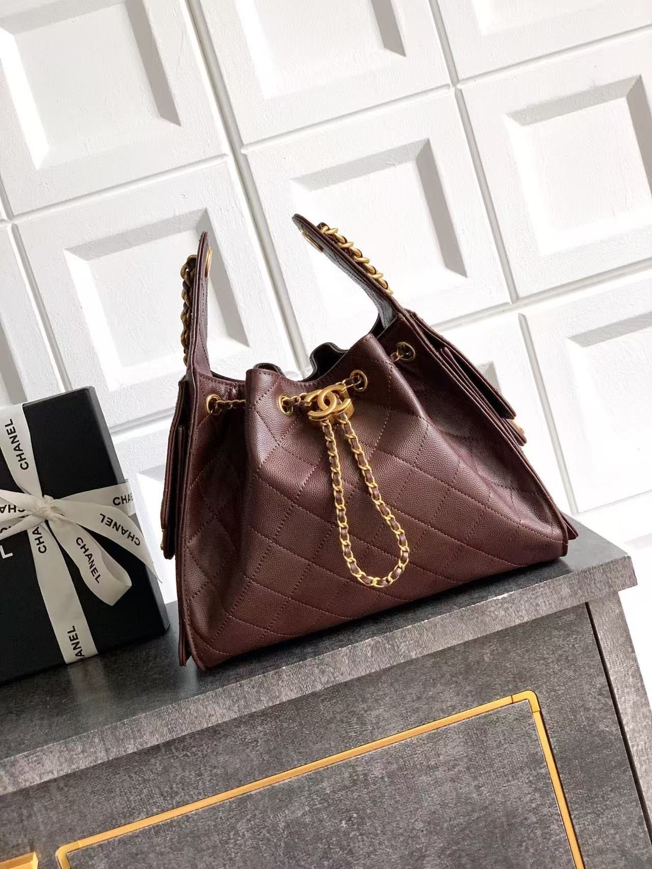 Chanel 25 burgundy handbag open view