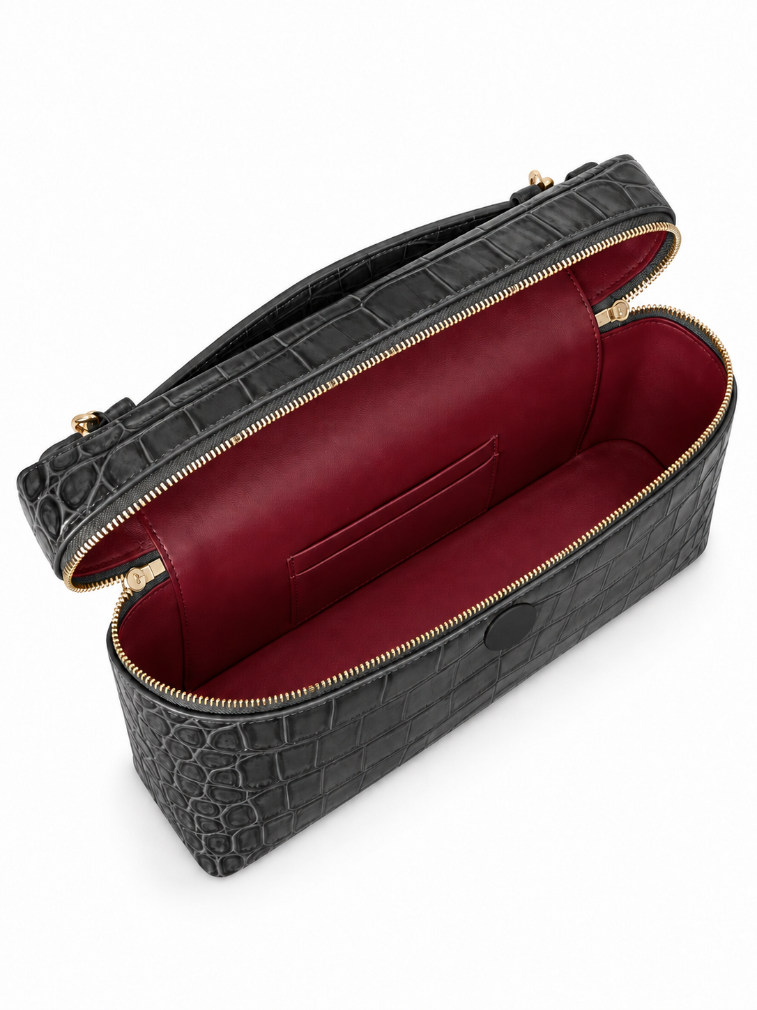 Dark gray vanity bag interior with logo covered