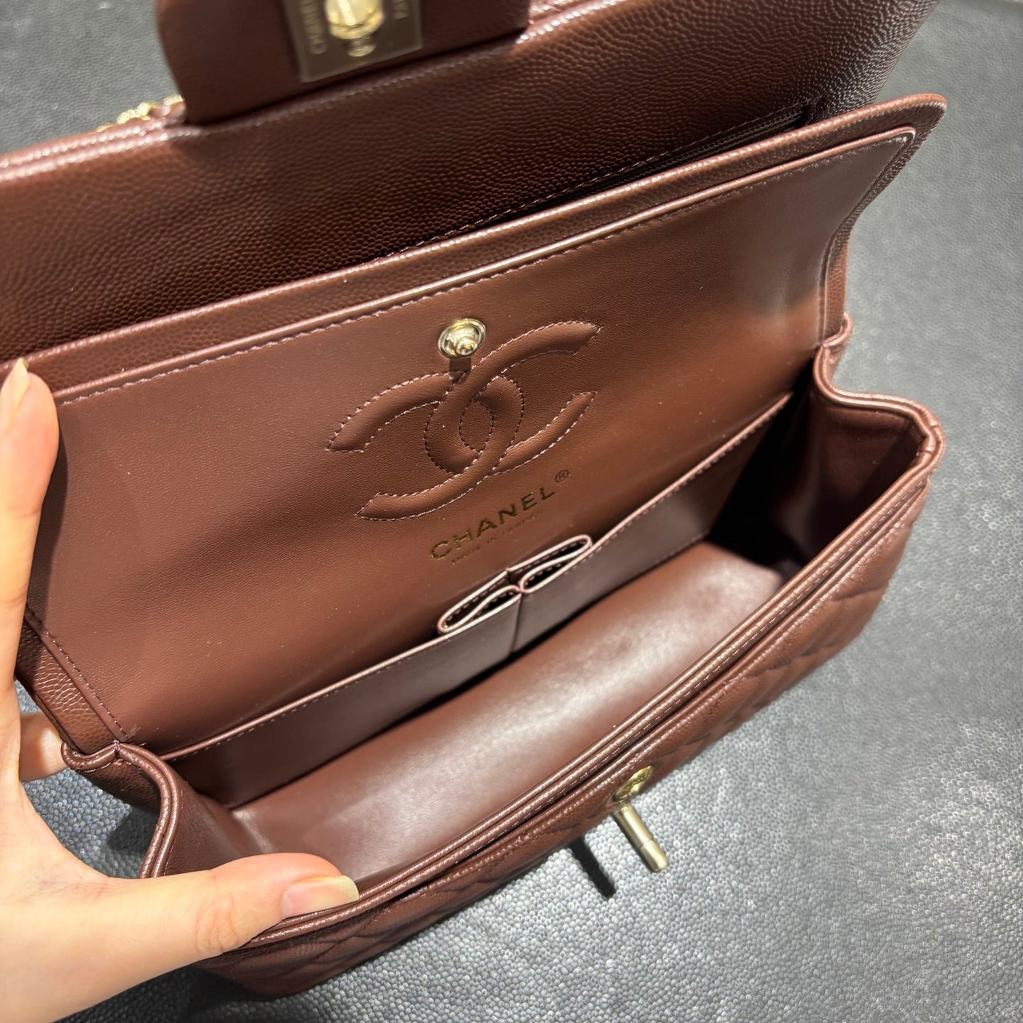 Chanel brown classic flap bag interior view