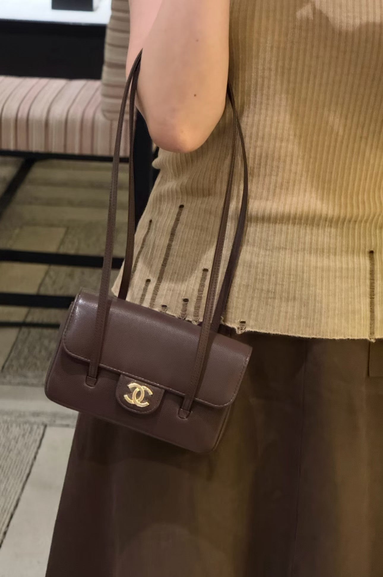 Brown shoulder bag on model