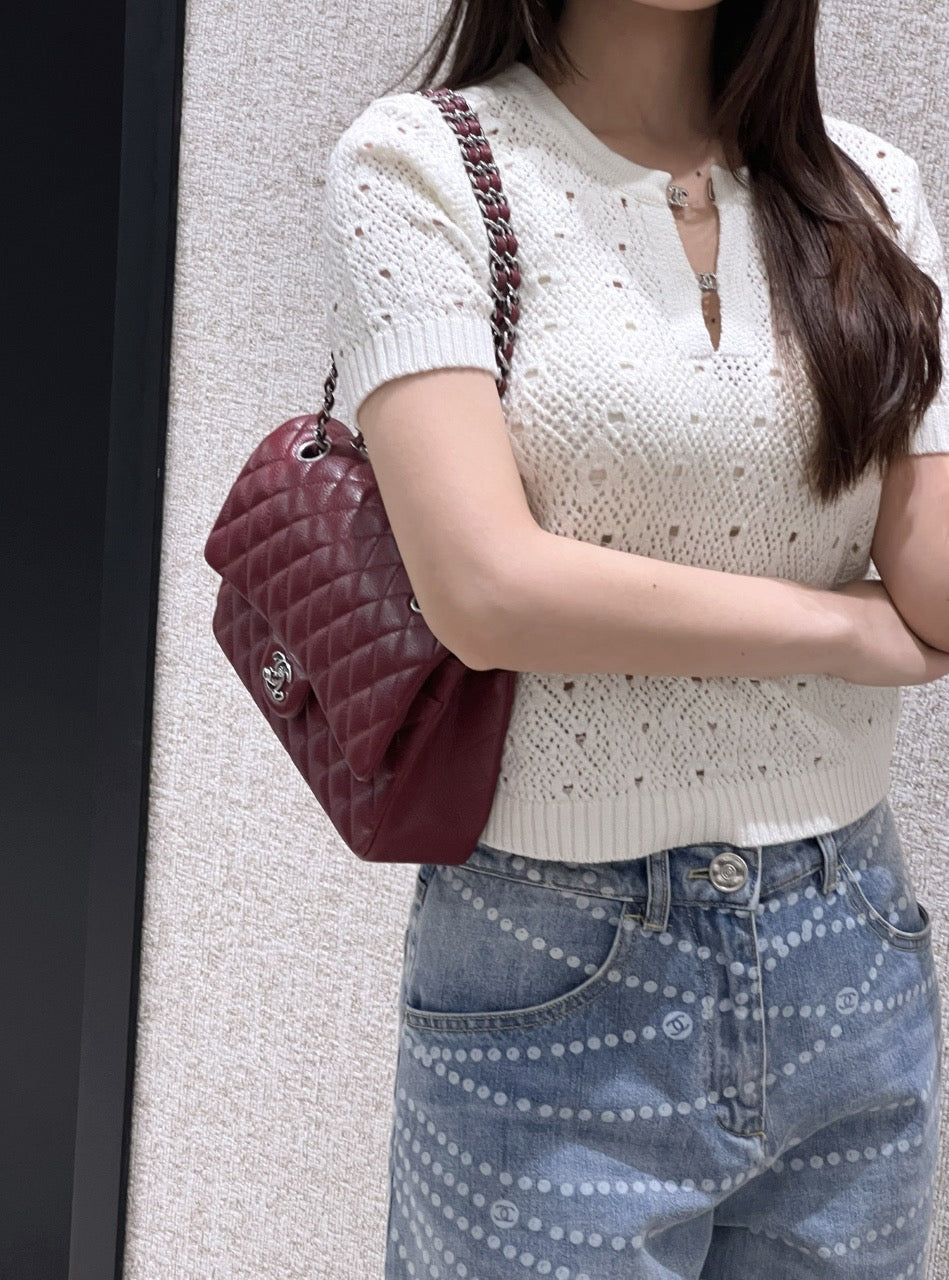 Chanel burgundy classic flap bag view 1