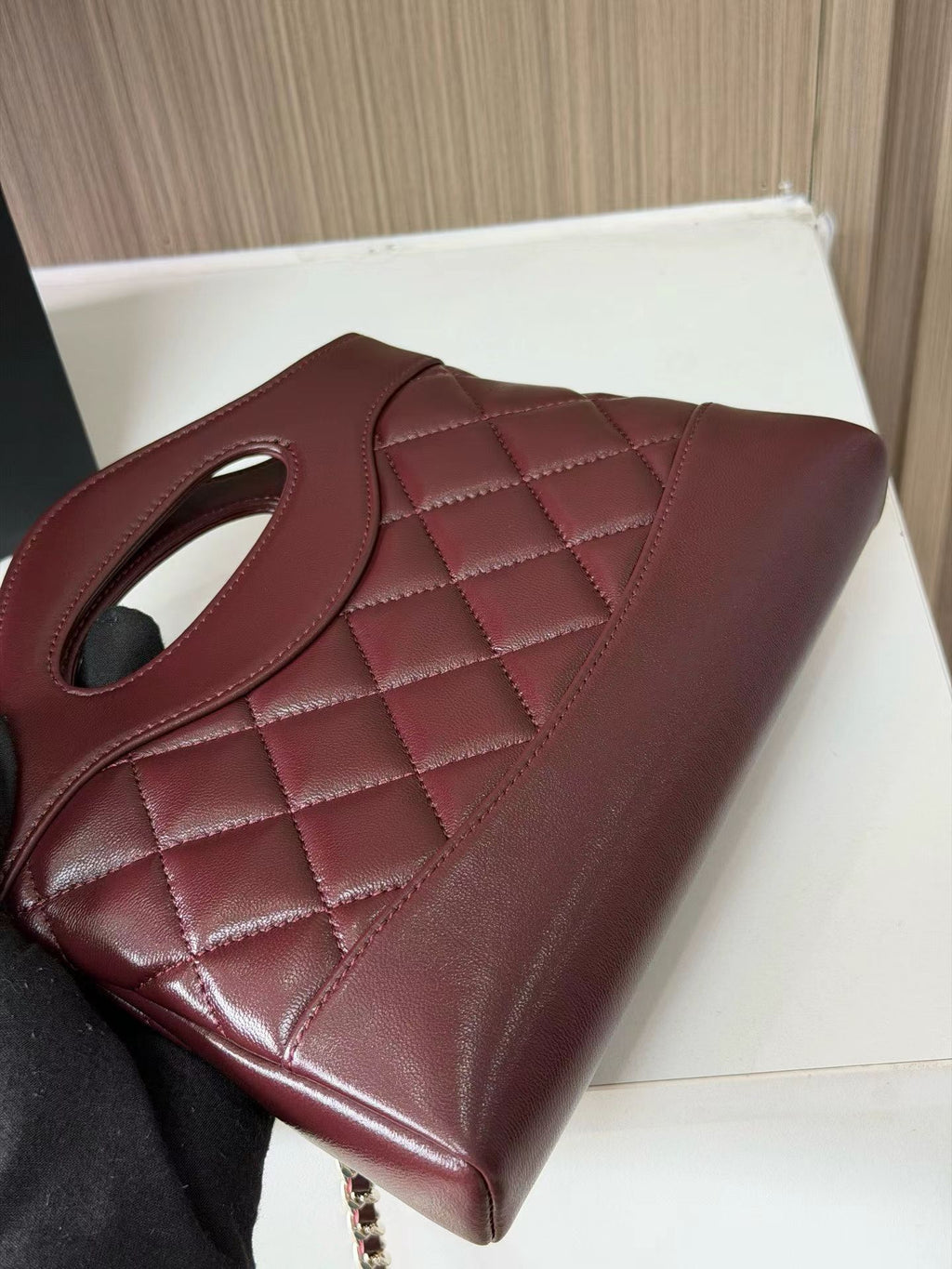 Burgundy quilted mini handbag back detail