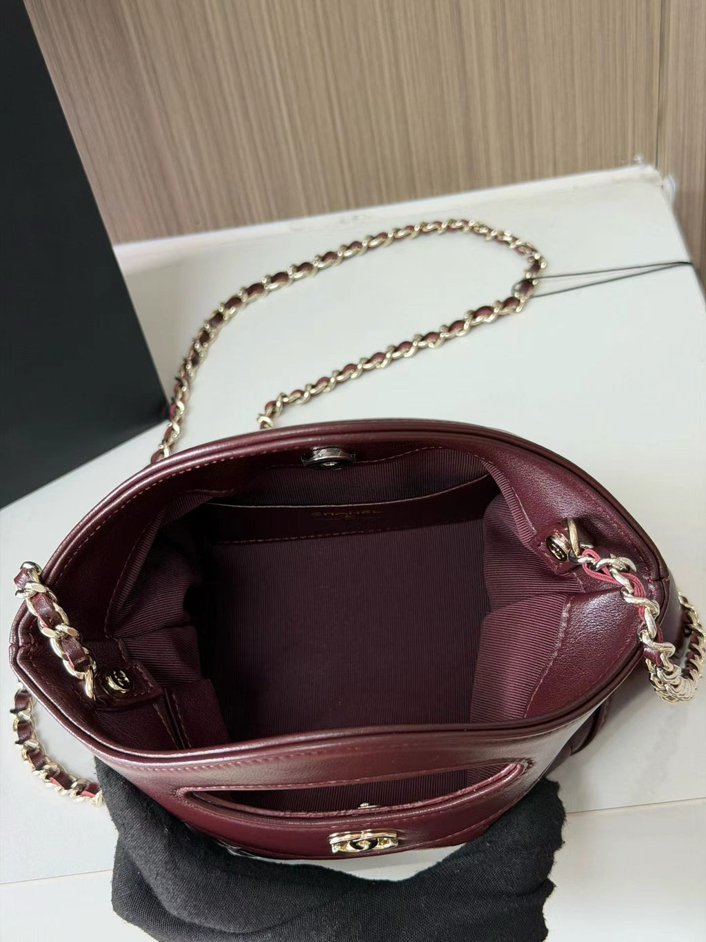 Burgundy quilted mini handbag interior