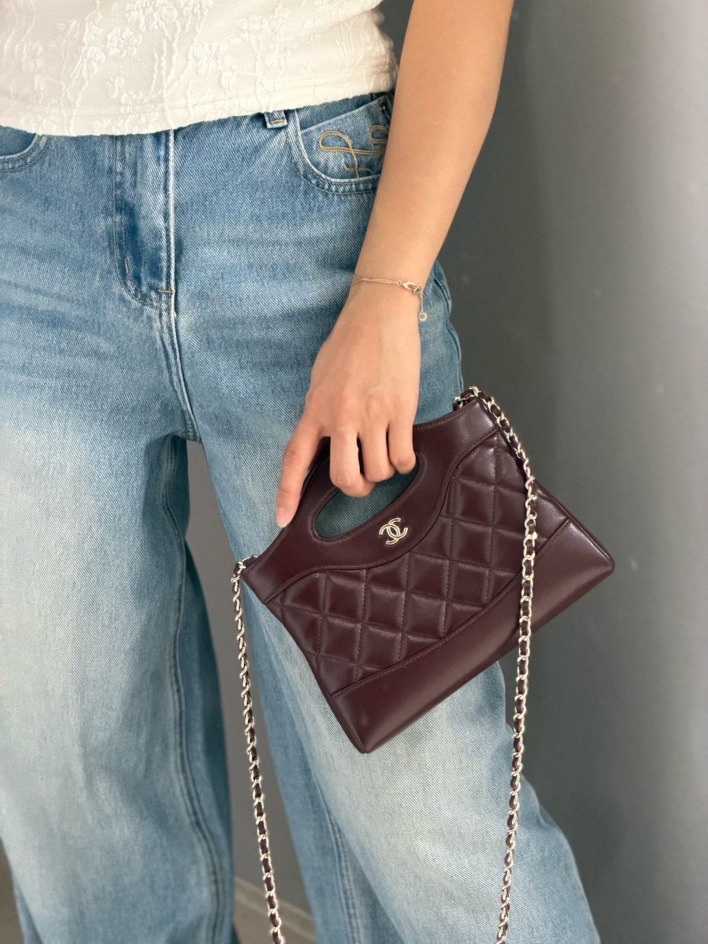 Burgundy quilted mini handbag hand carry