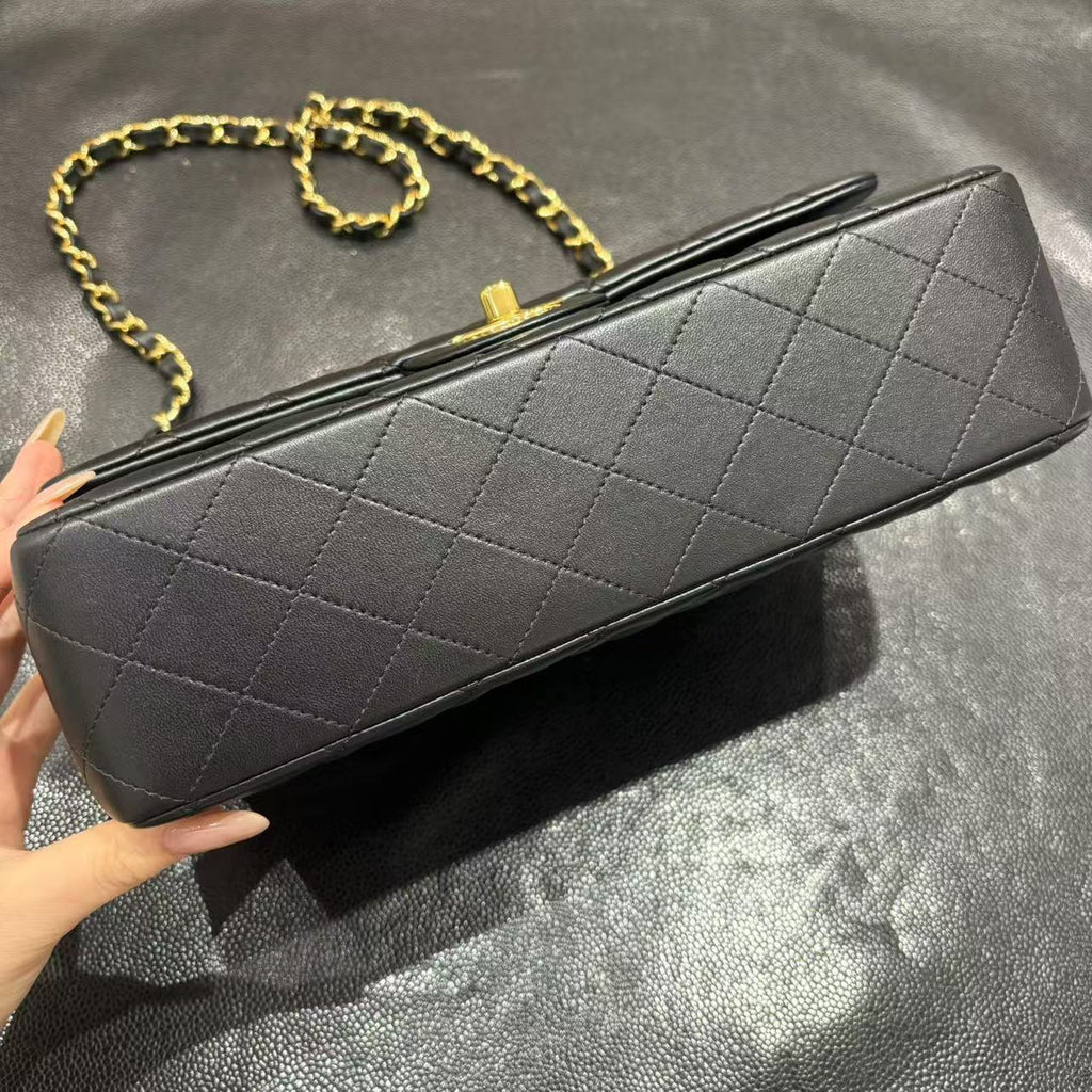 Chanel Classic Flap bag in black, base view