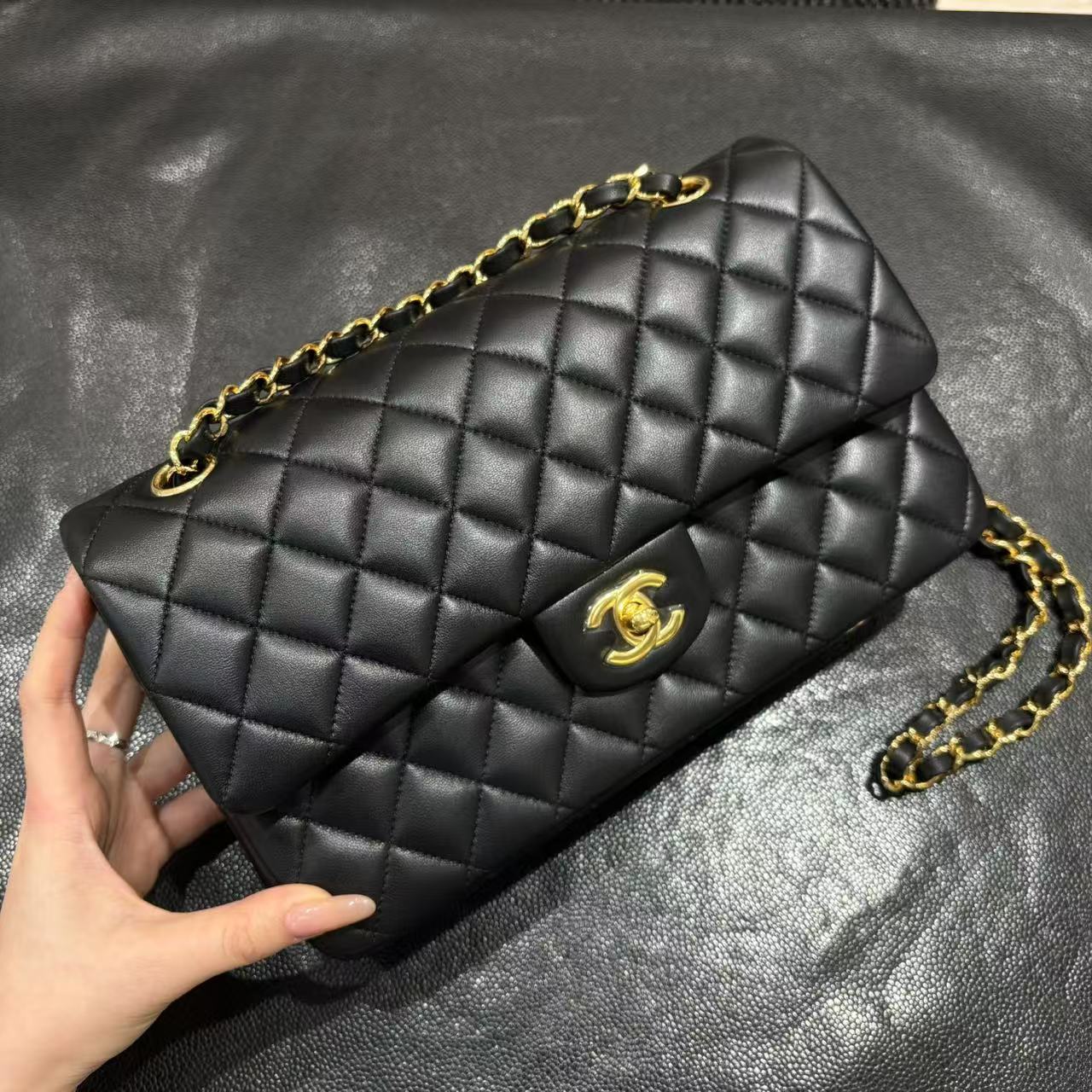 Chanel Classic Flap bag in black, front view