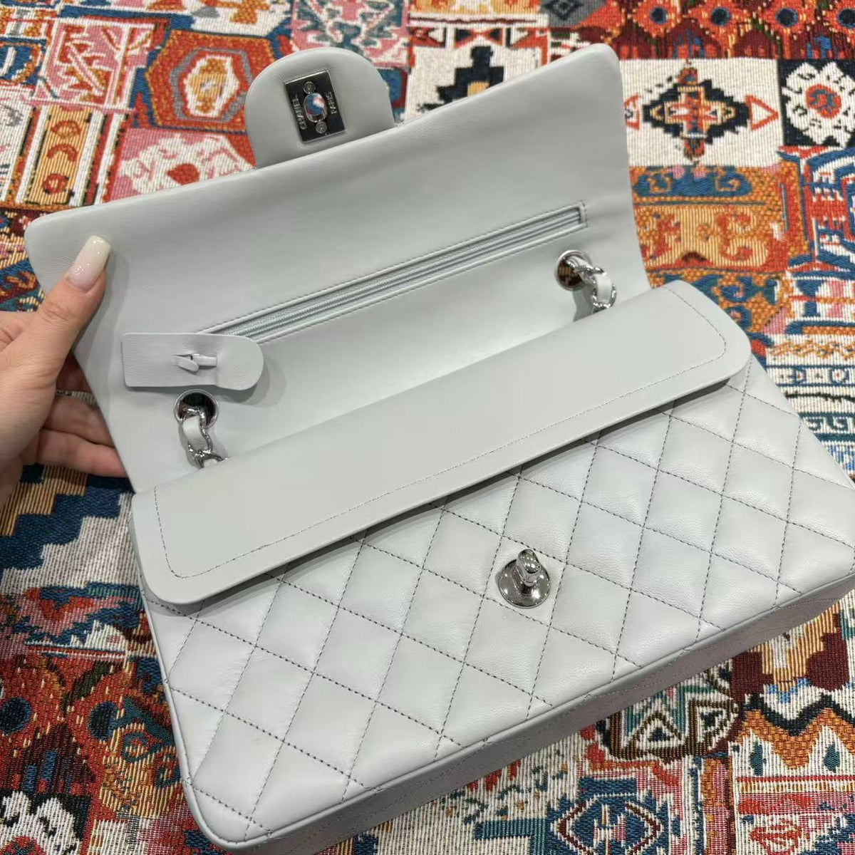 Chanel Classic Flap bag in light gray, open double flap