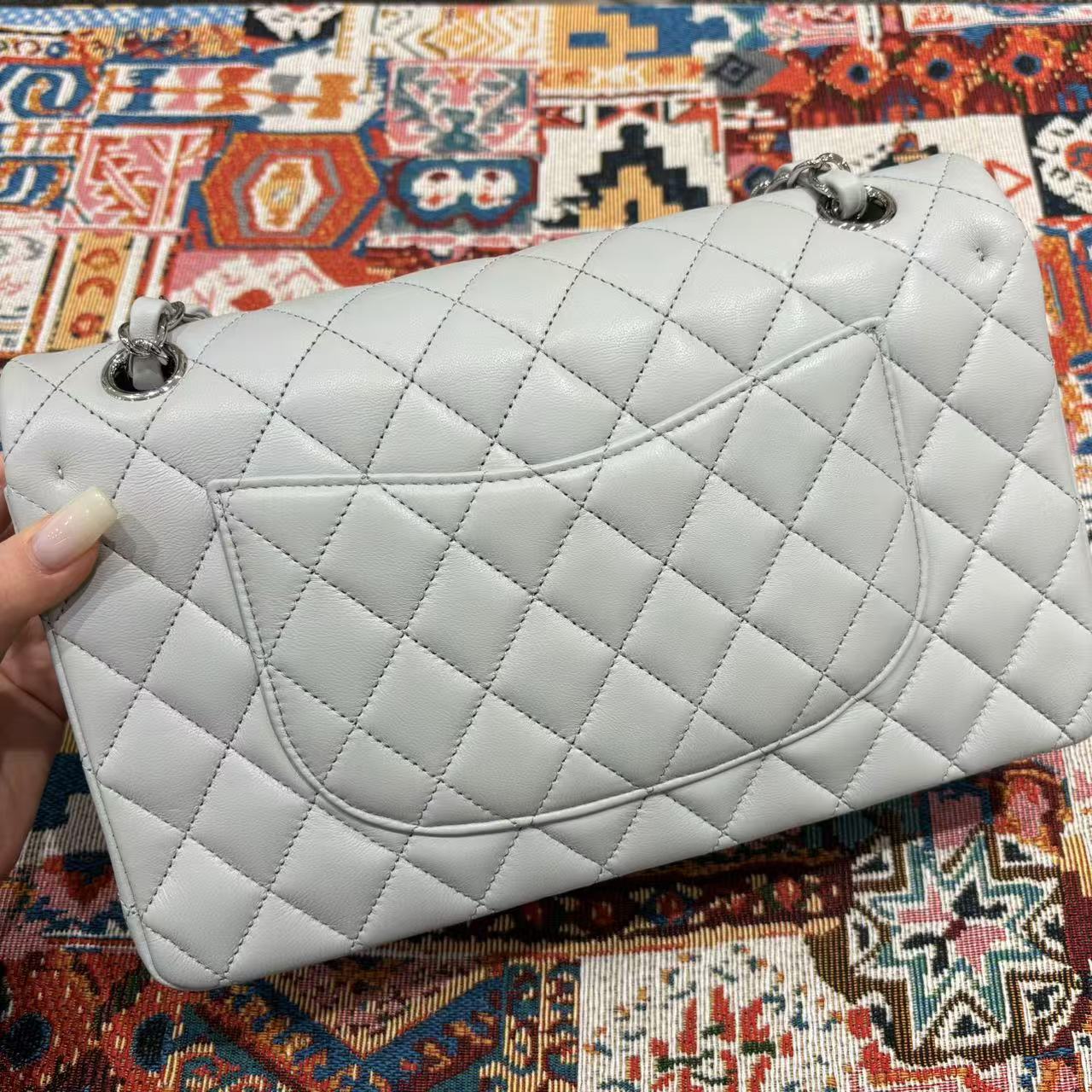 Chanel Classic Flap bag in light gray, rear view