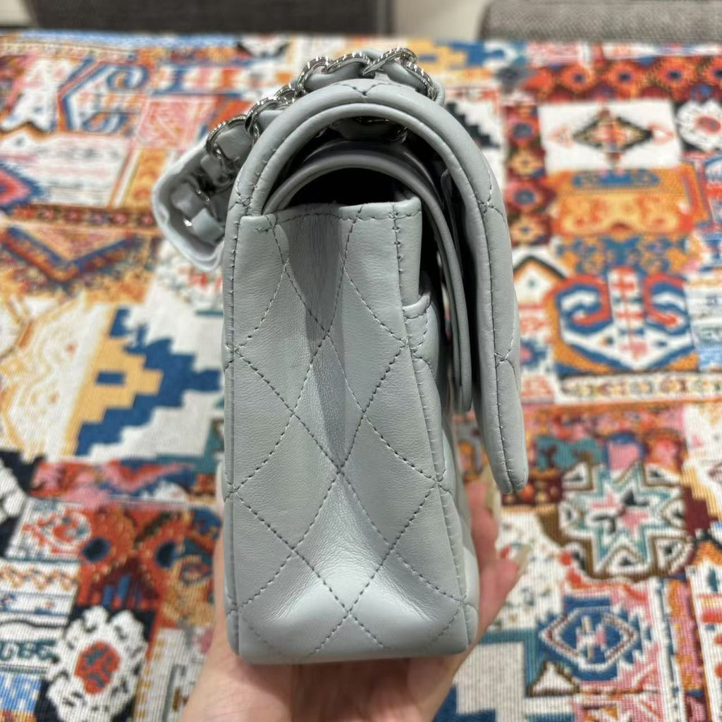 Chanel Classic Flap bag in light gray, side view