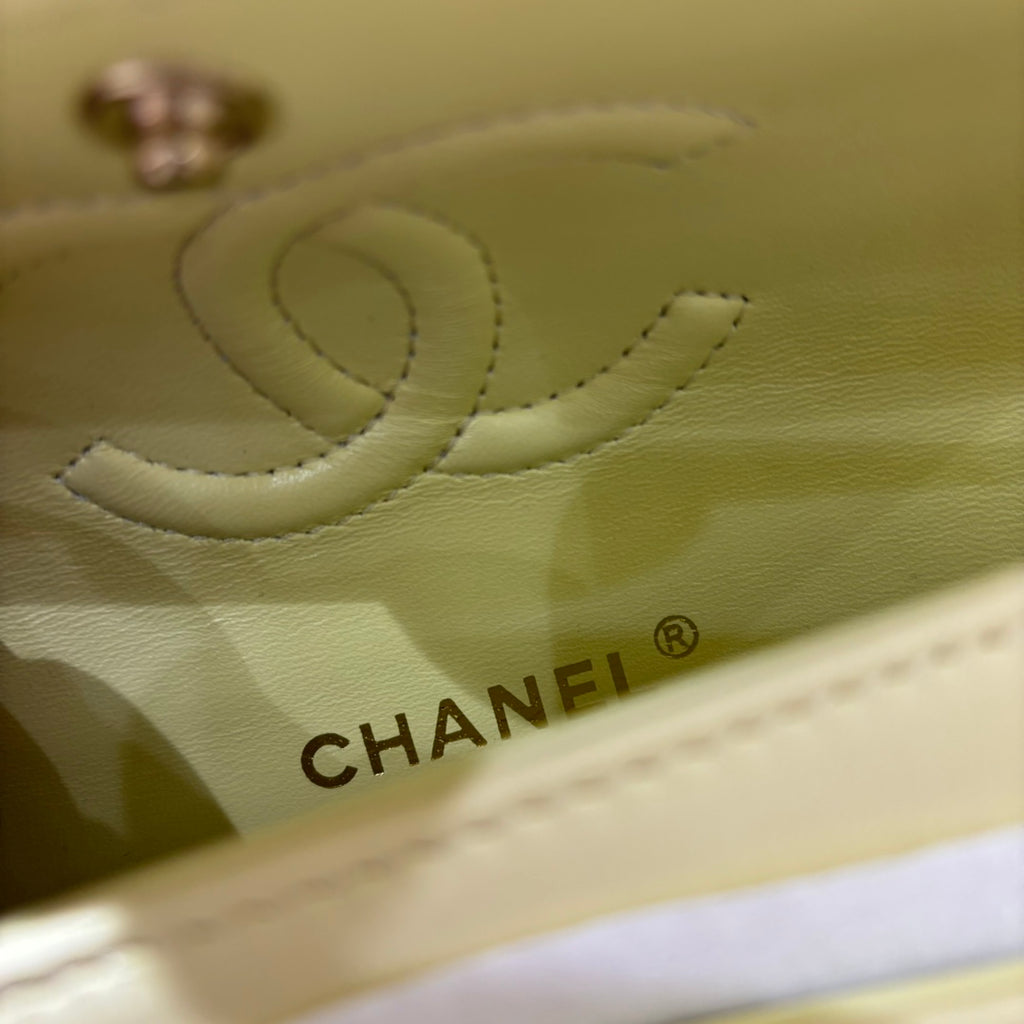 Chanel Classic Flap bag pale yellow interior logo detail