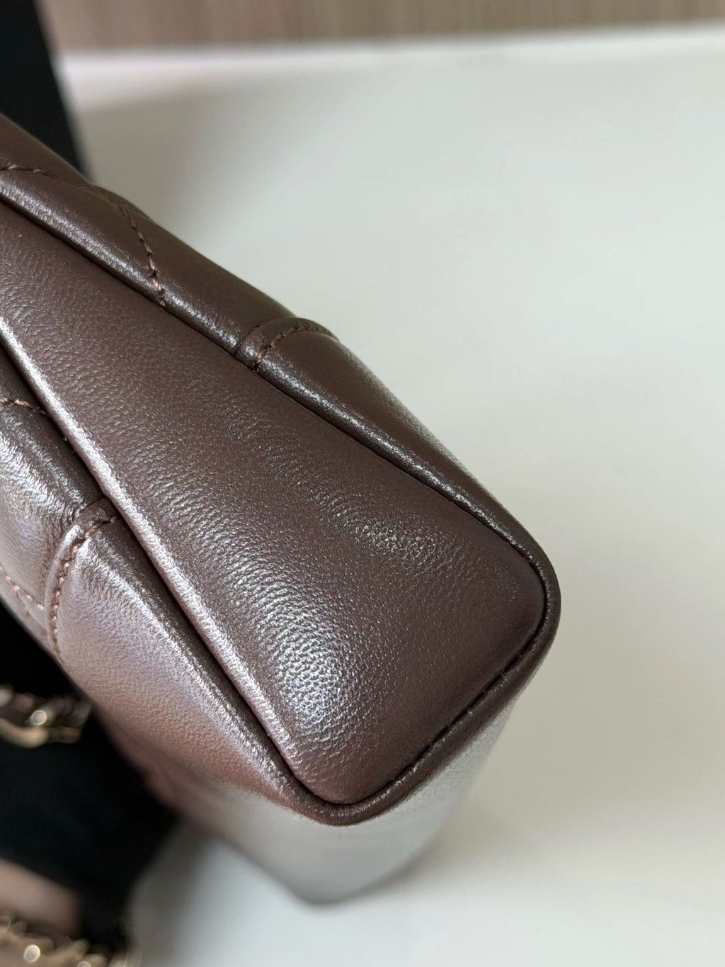 Dark brown mini handbag side leather detail
