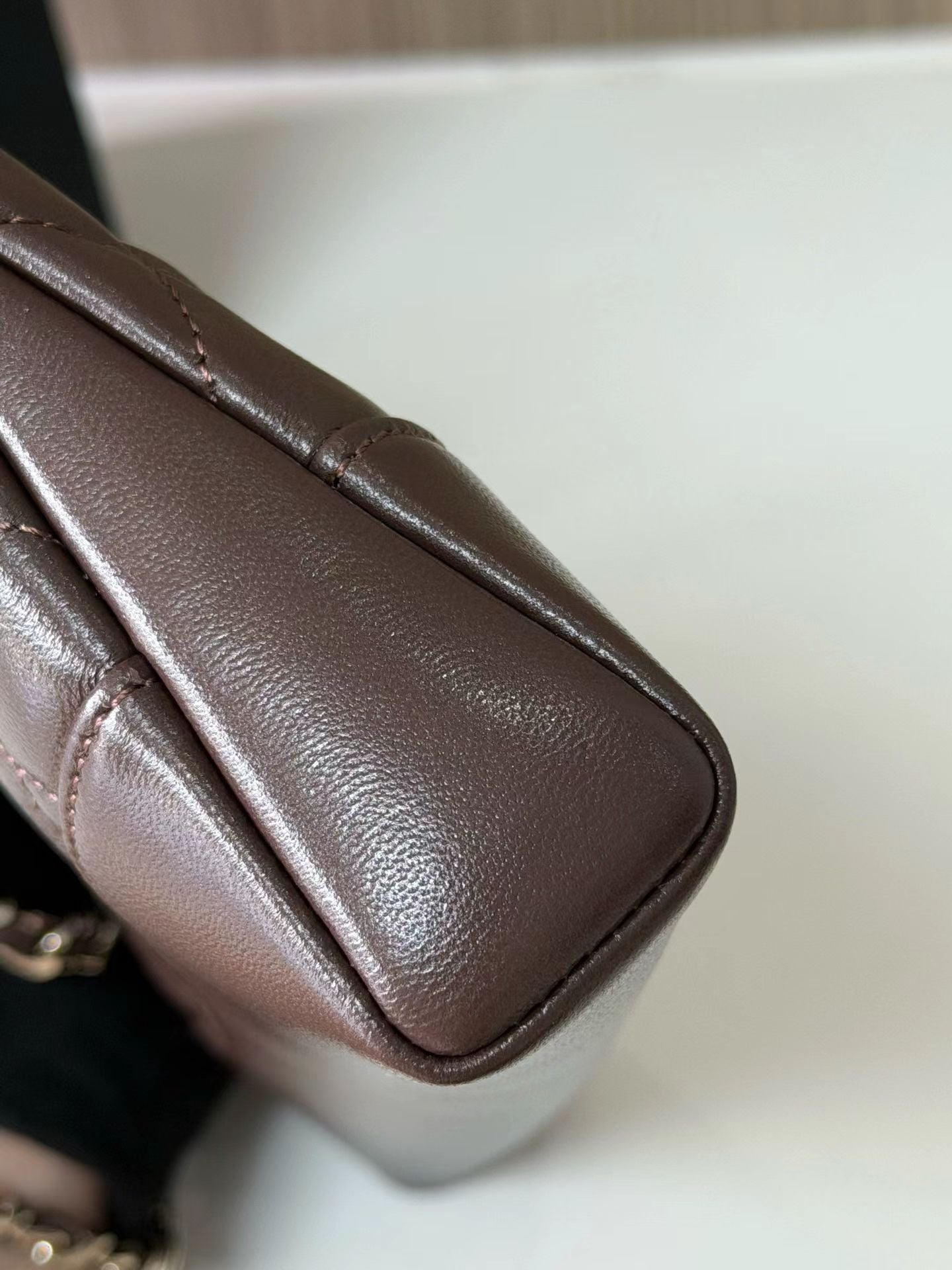 Dark brown mini handbag side leather detail