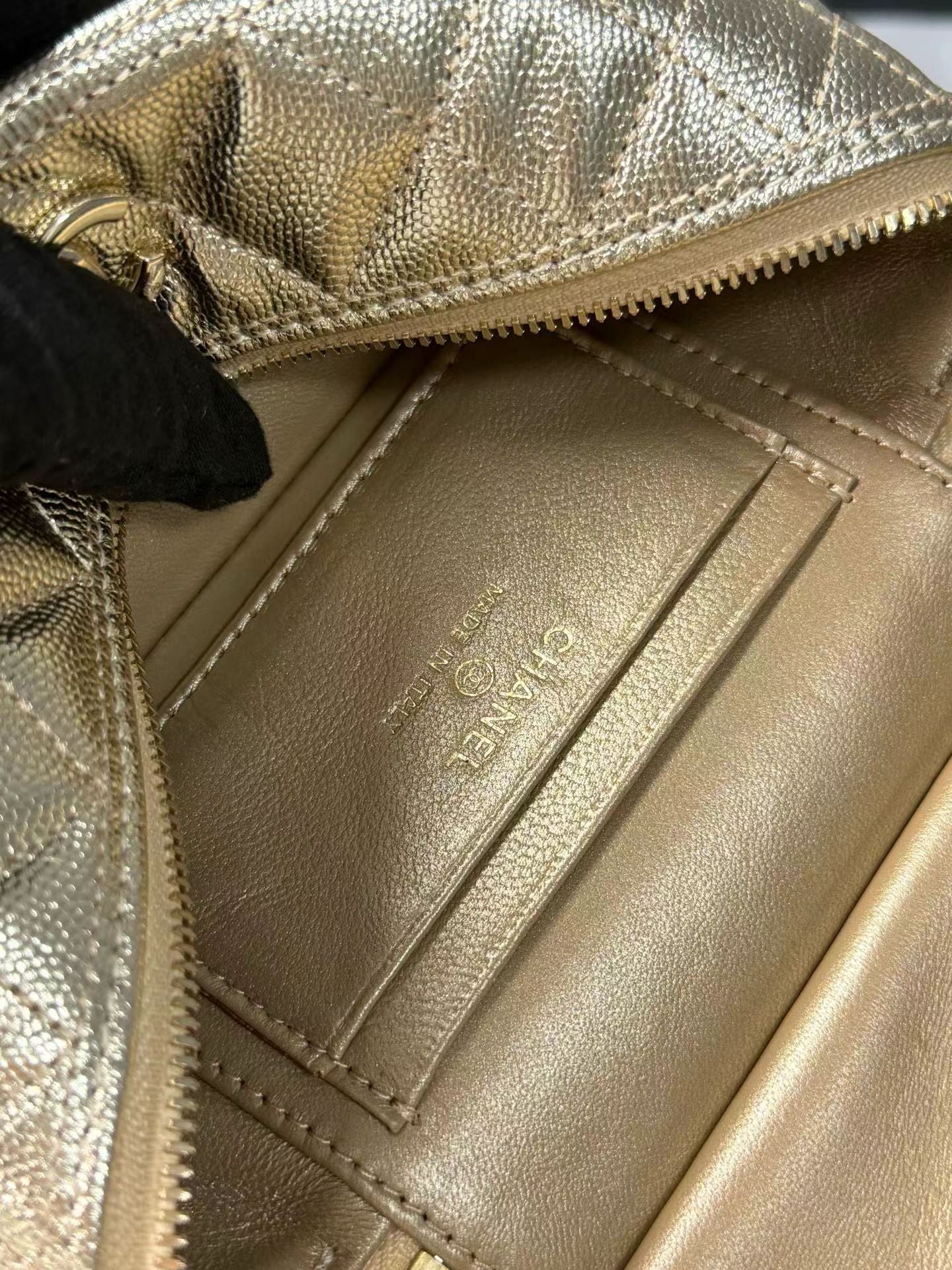 Gold handbag interior detail