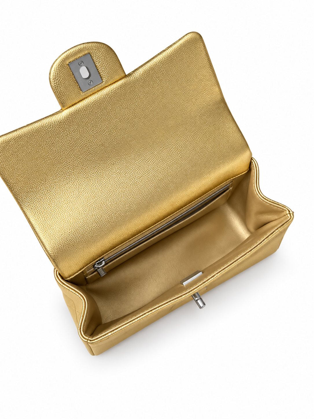 Chanel metallic Gold top handle bag — interior — white background