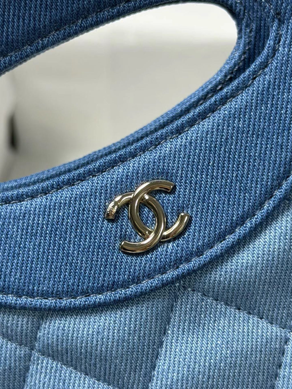 Nano denim handbag logo close-up