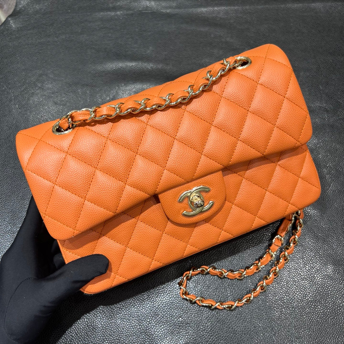 Chanel orange classic flap bag front view