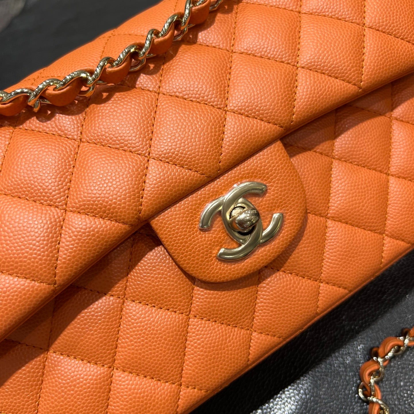 Chanel orange classic flap bag front close-up