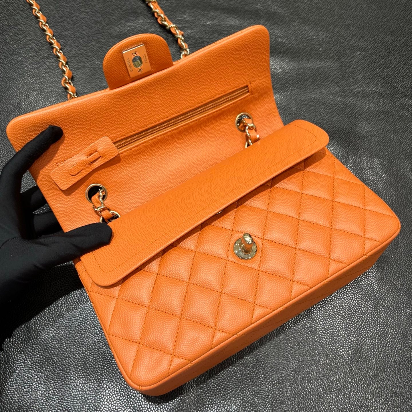 Chanel orange classic flap bag open view