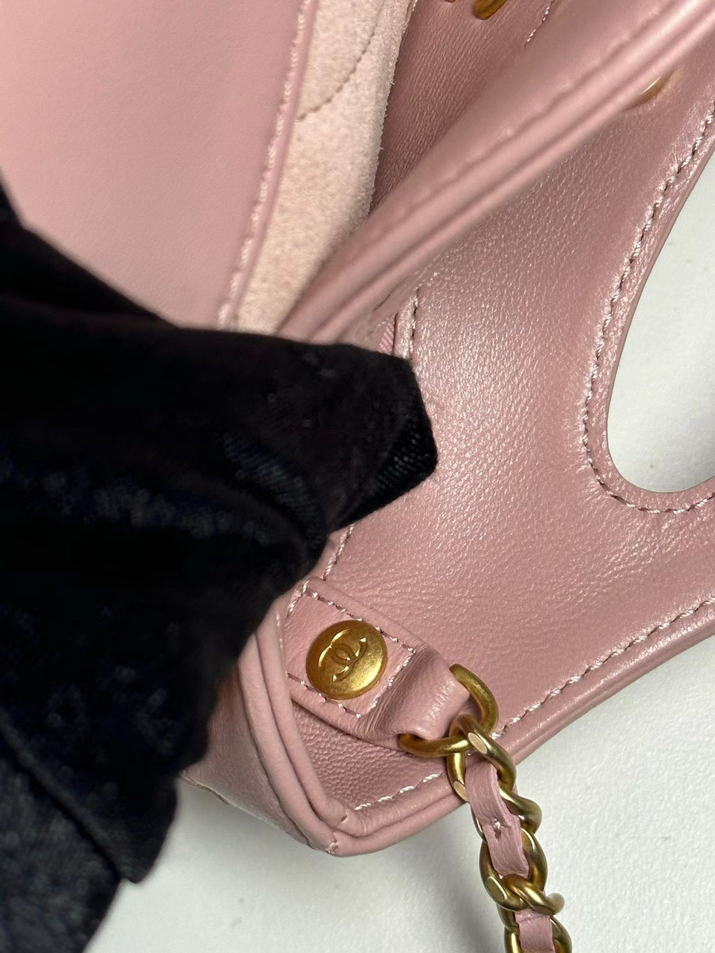 Pink Chanel handbag hardware detail