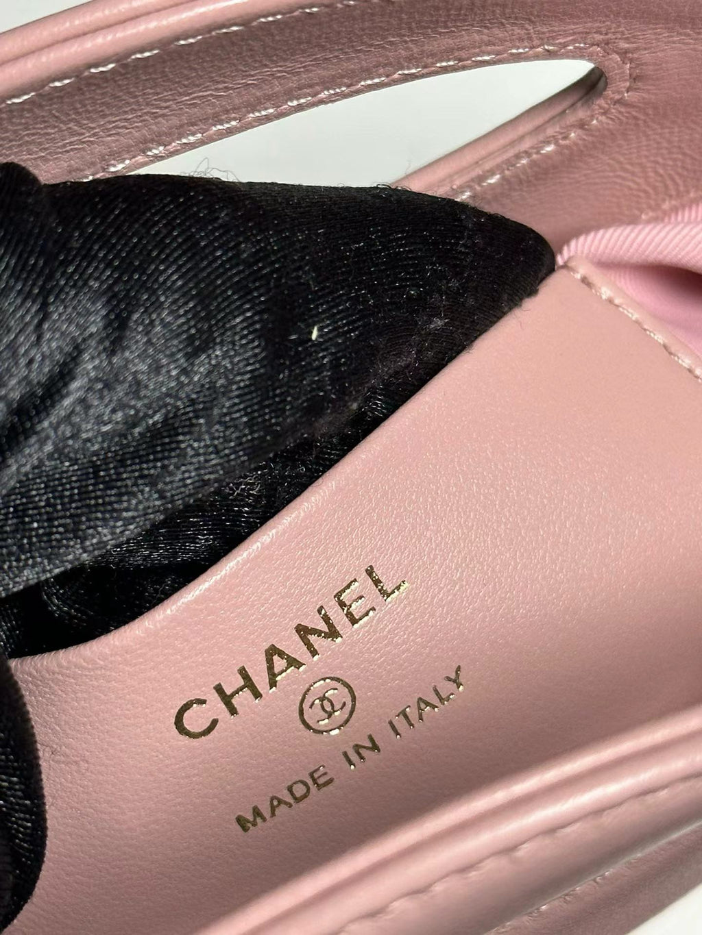 Pink Chanel handbag interior stamp detail