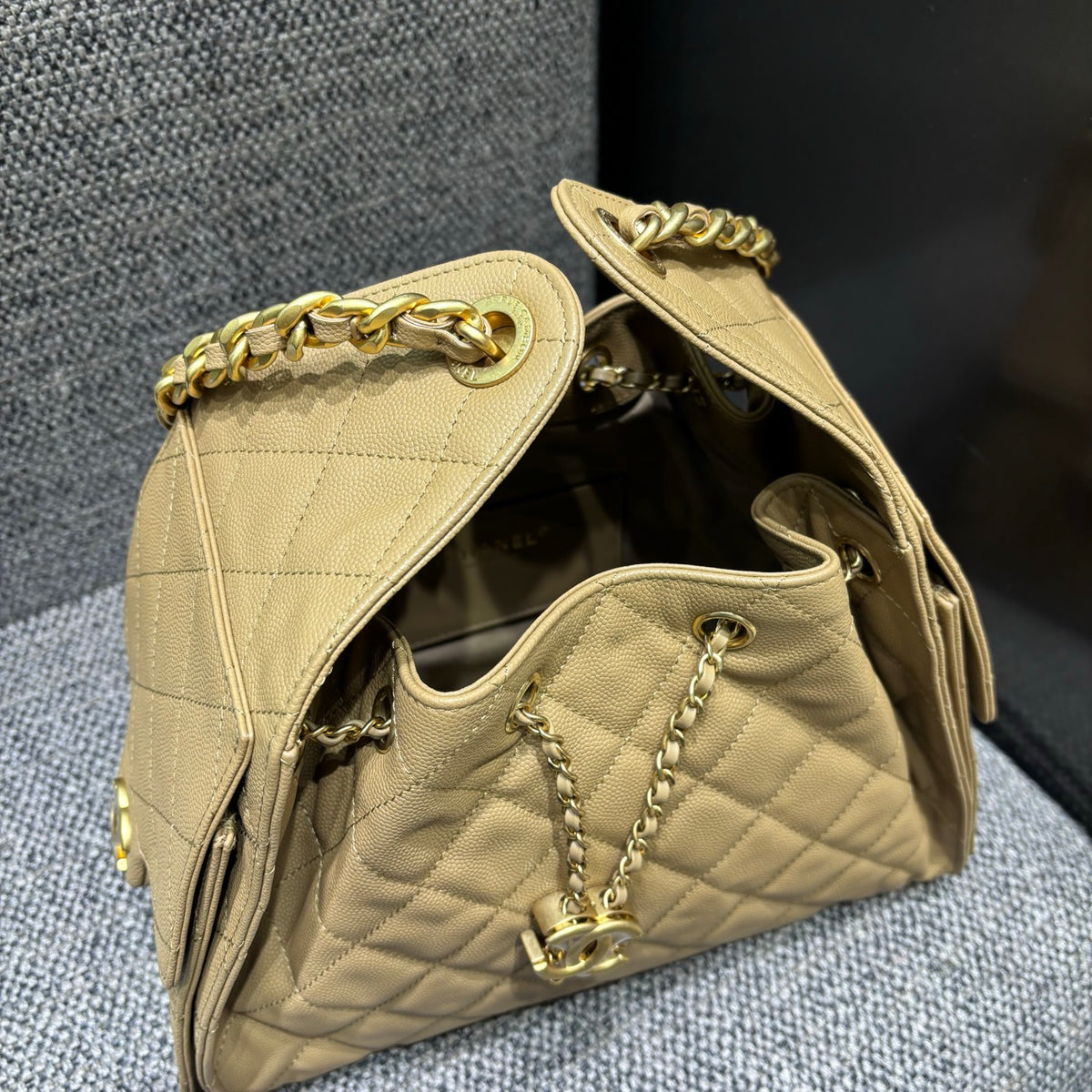 Chanel beige drawstring bucket bag open top