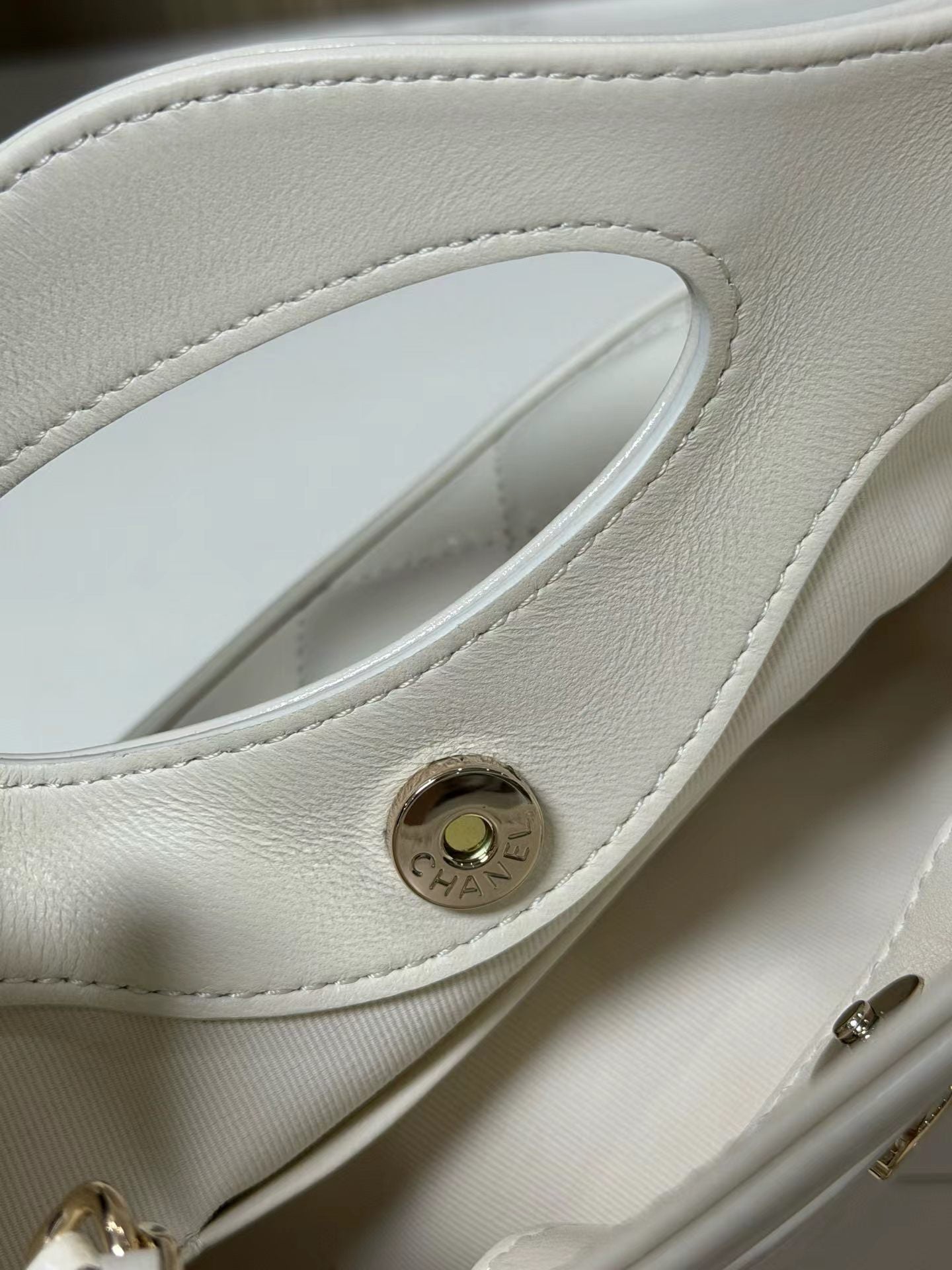 White mini handbag interior detail