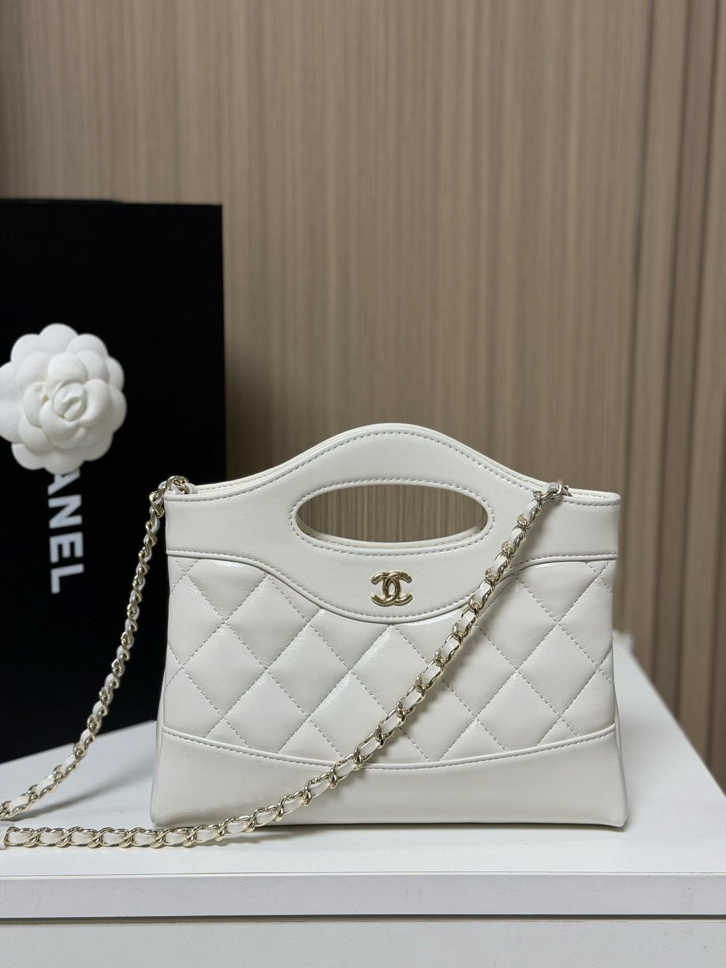 White quilted mini handbag with chain