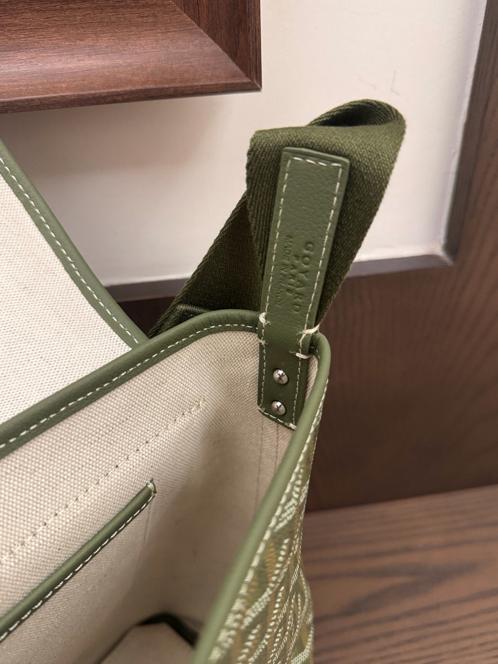 Goyard green messenger bag strap detail