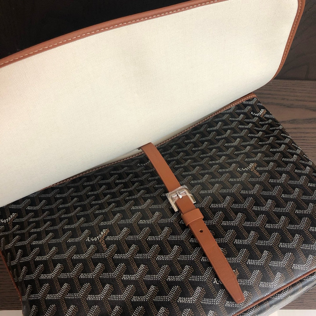 Messenger bag black and tan flap detail