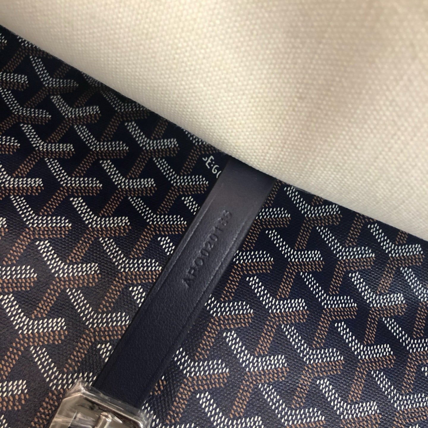 Goyard messenger bag dark color leather detail