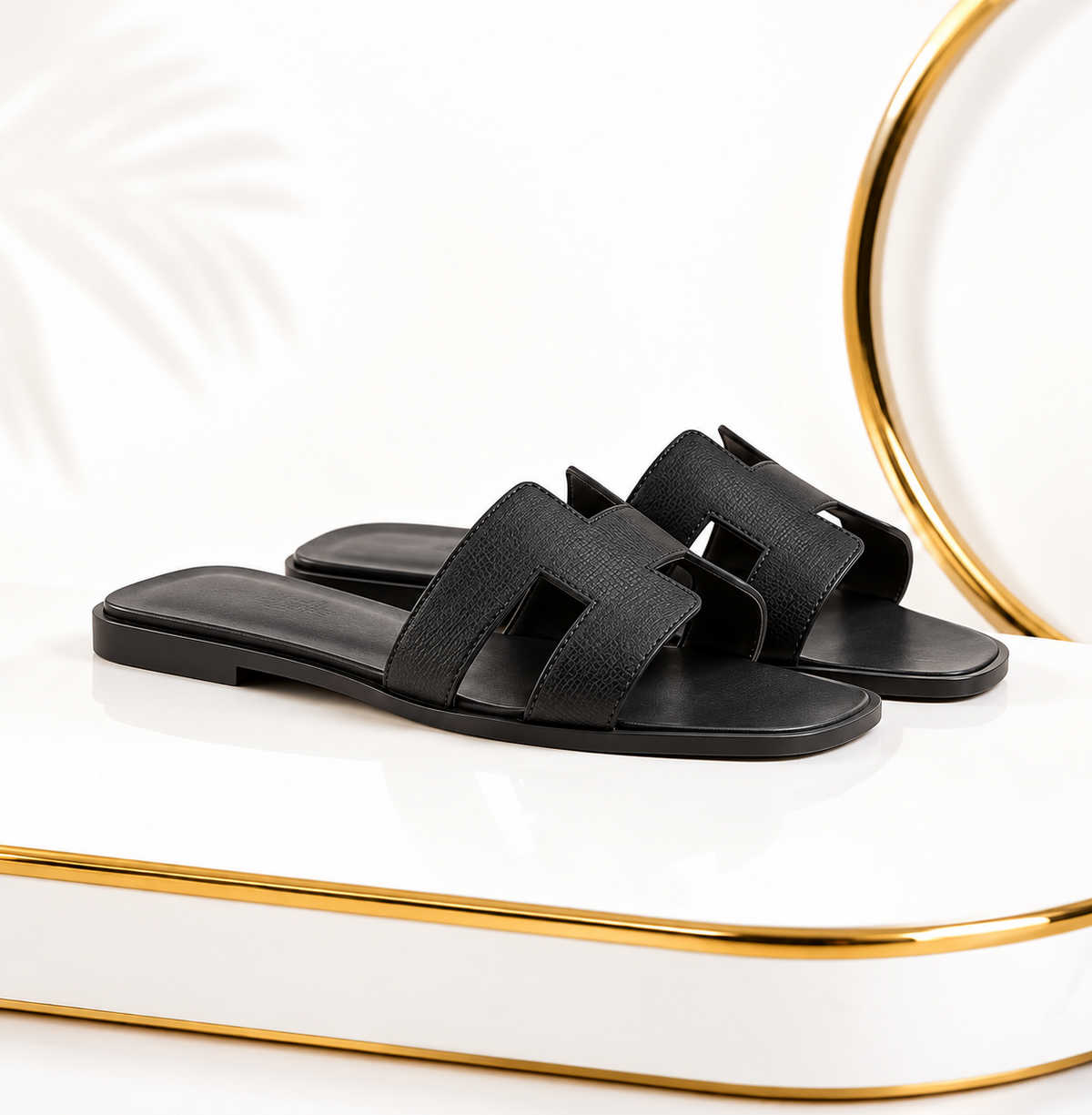 Hermès Oran Noir Epsom leather sandals